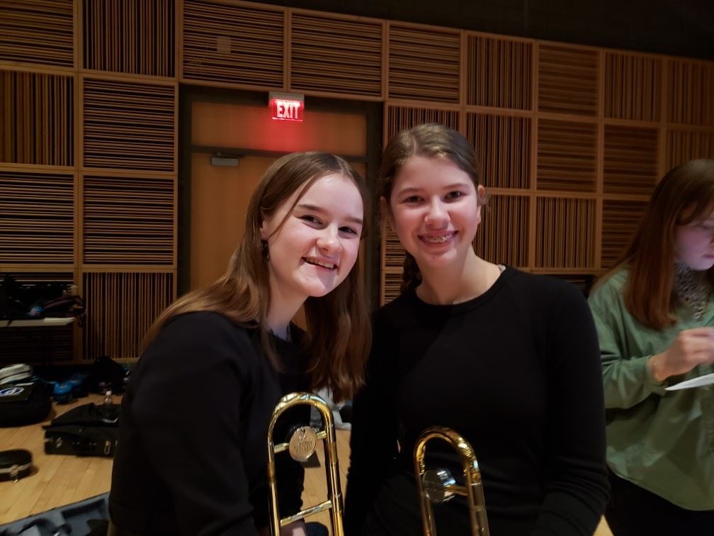  Two band students pose together